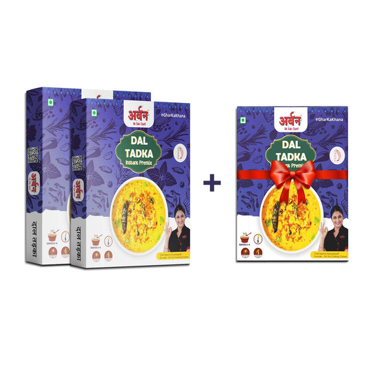 Two dal tadka premix boxes adorned with a bow, highlighting the buy 2, get 1 free promotion.